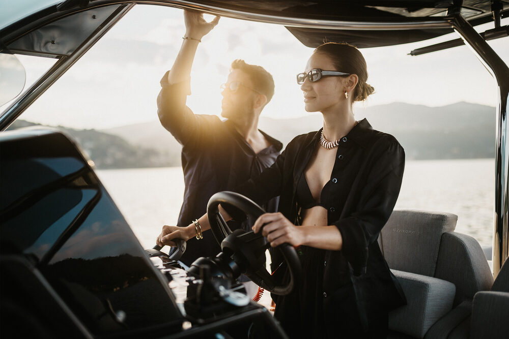 A stylish couple navigating the Sacs Strider 13 during sunset 