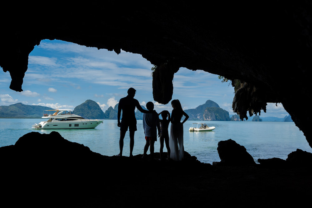 A family exploring hidden coves in Krabi, Thailand 